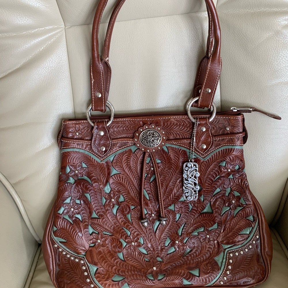 American West Brown & Teal Leather Women’s Shoulder Purse with Silver Accents.